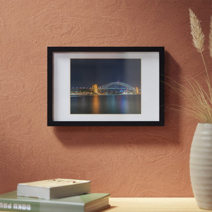 The dazzling Sydney Harbour Bridge at night printed on a black framed poster