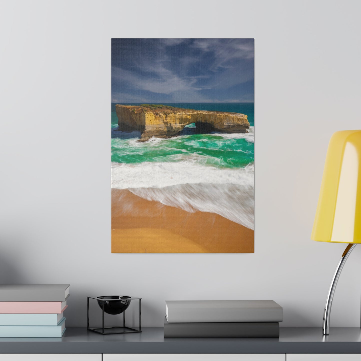 The London Bridge arch with crashing waves printed on a stretched matte canvas