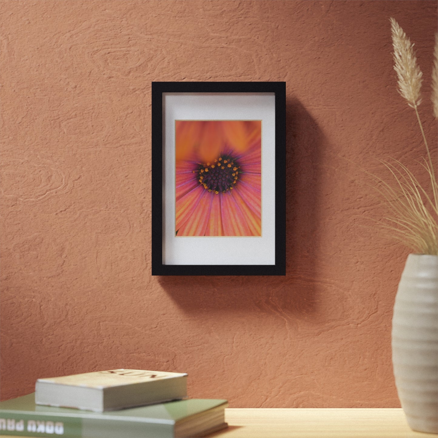 Colorful daisy printed on a black framed posters