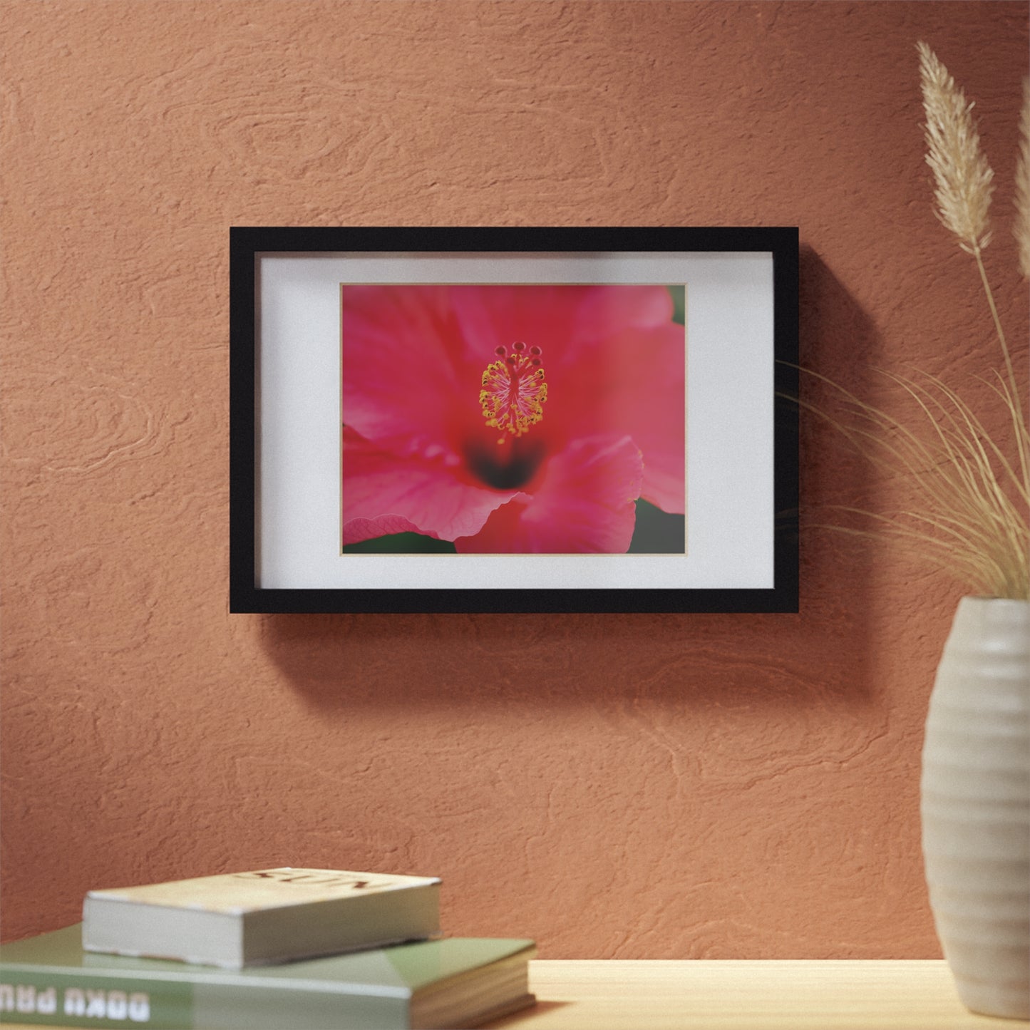 A beautiful hibiscus flower printed on a black framed poster