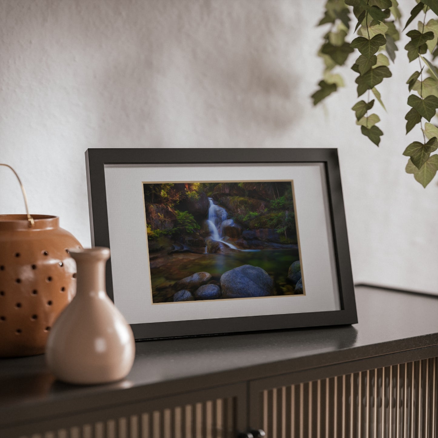 Watercolor styled print of the Ladies Bath falls on a black framed poster