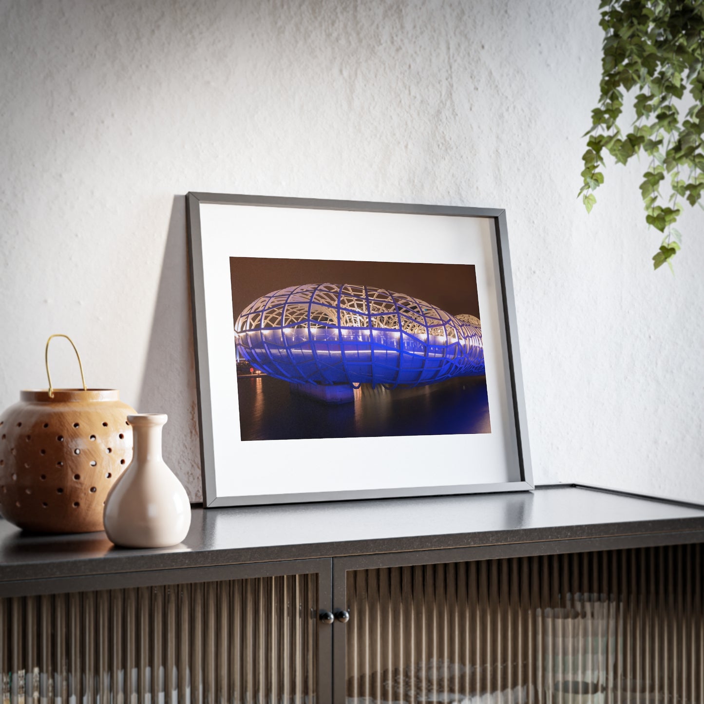 The beautiful Webb Bridge illuminated at night printed on a framed matte poster