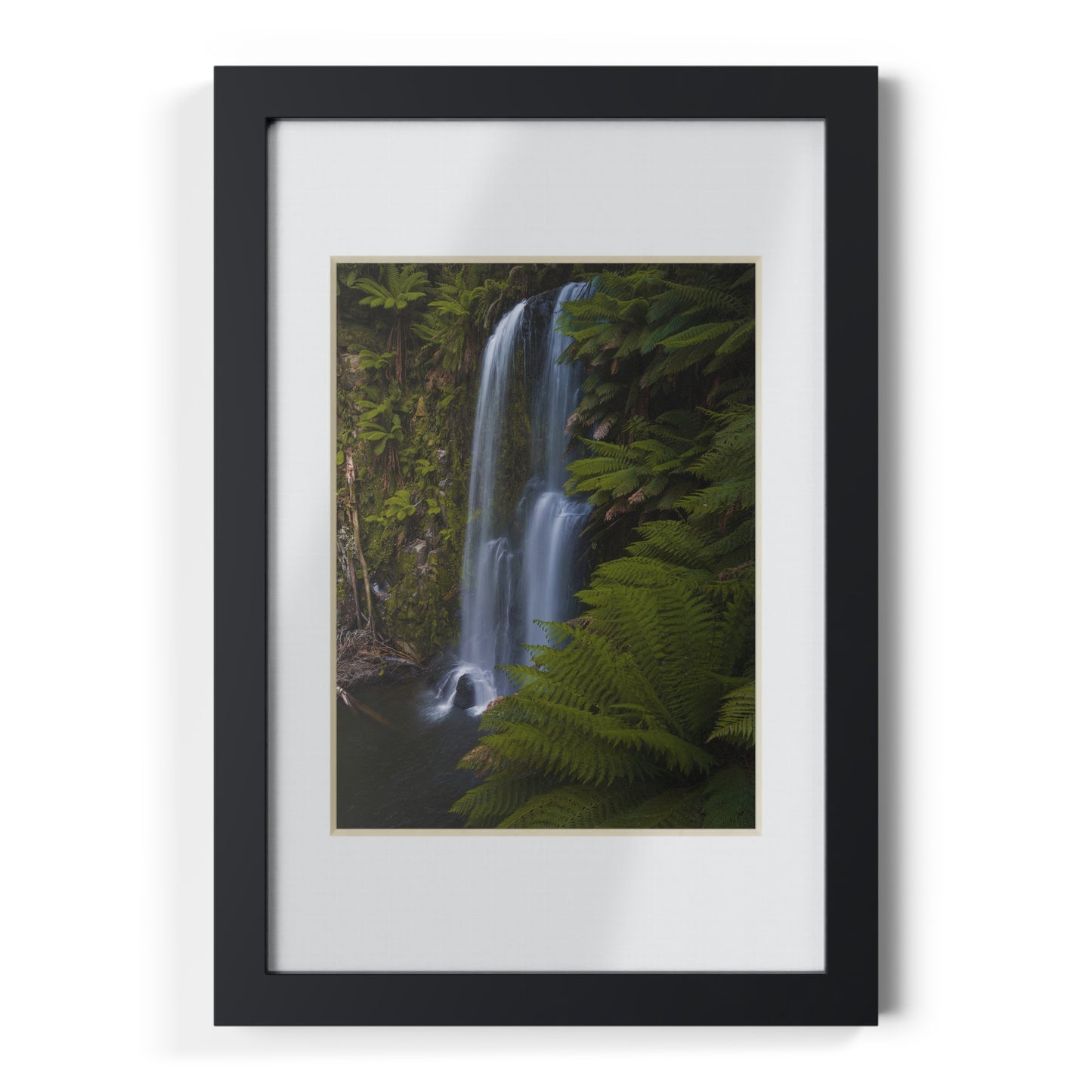 The beautiful Beauchamp Falls printed on a black framed poster