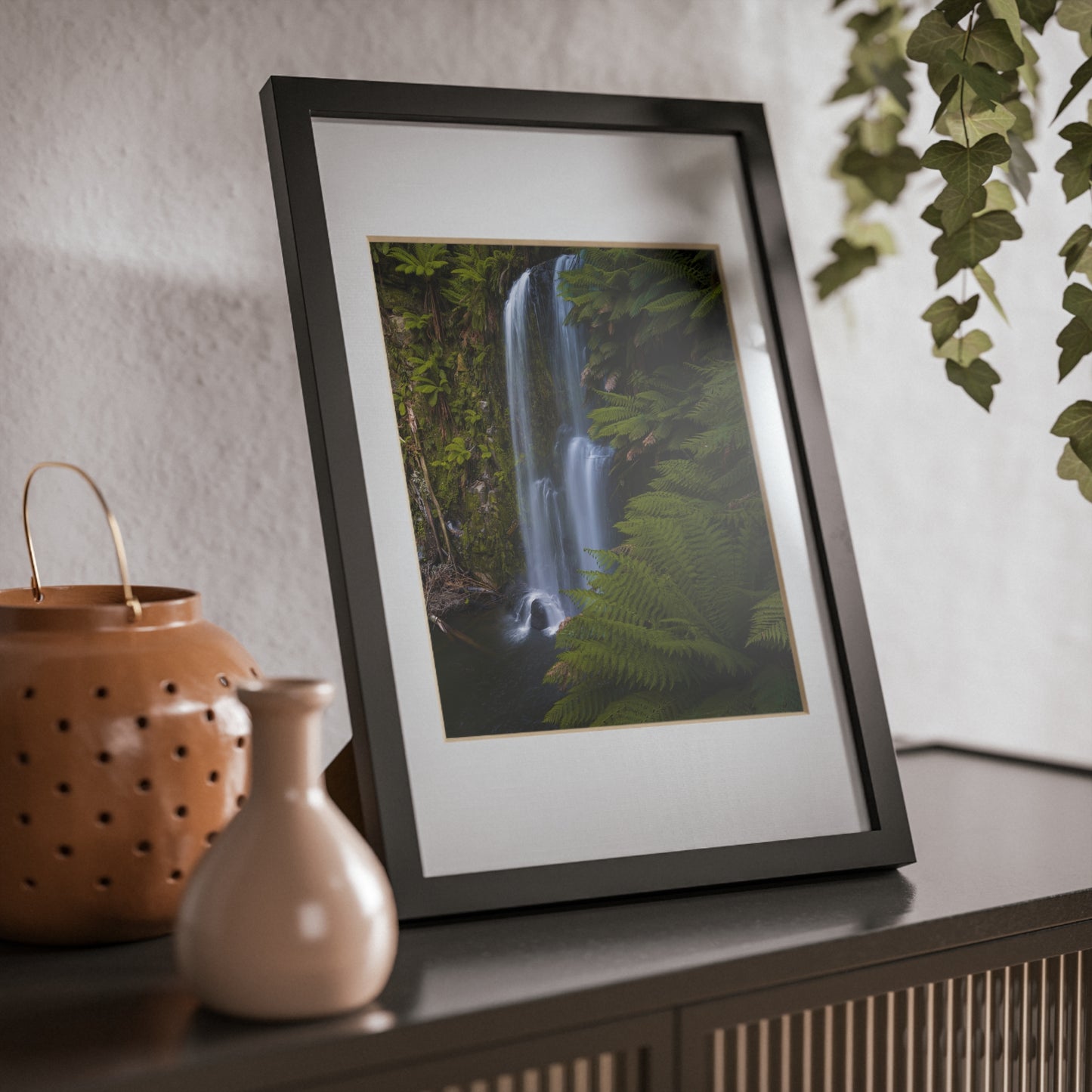 The beautiful Beauchamp Falls printed on a black framed poster