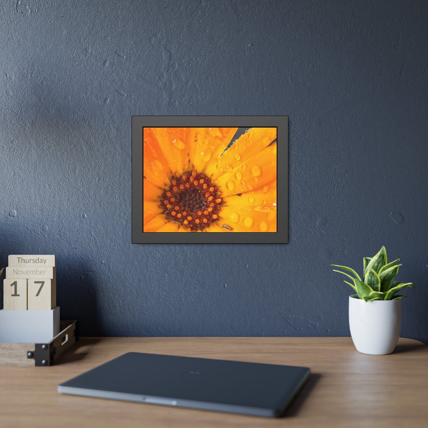 Drenched yellow flower printed on a framed paper poster