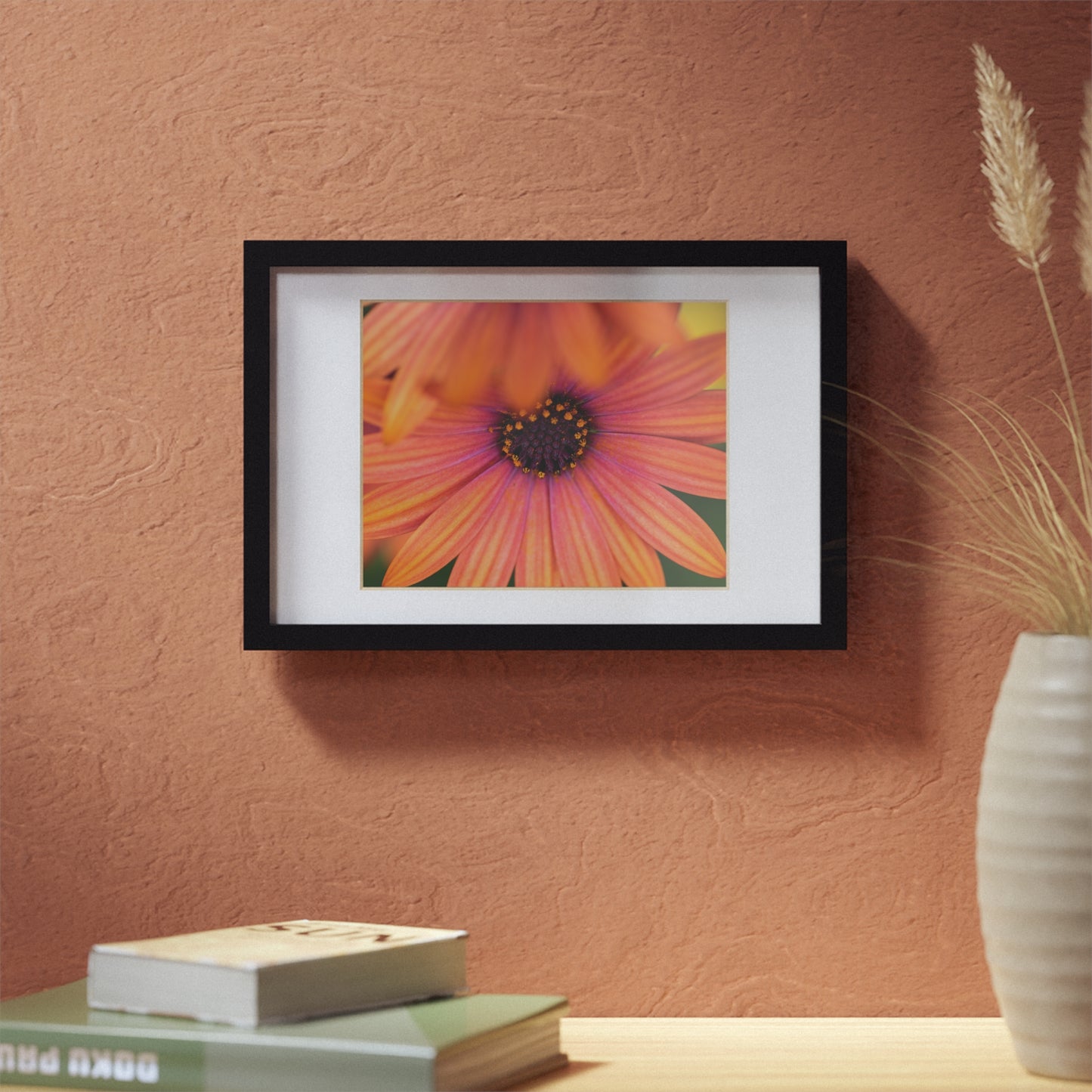 Colorful daisy printed on a black framed posters