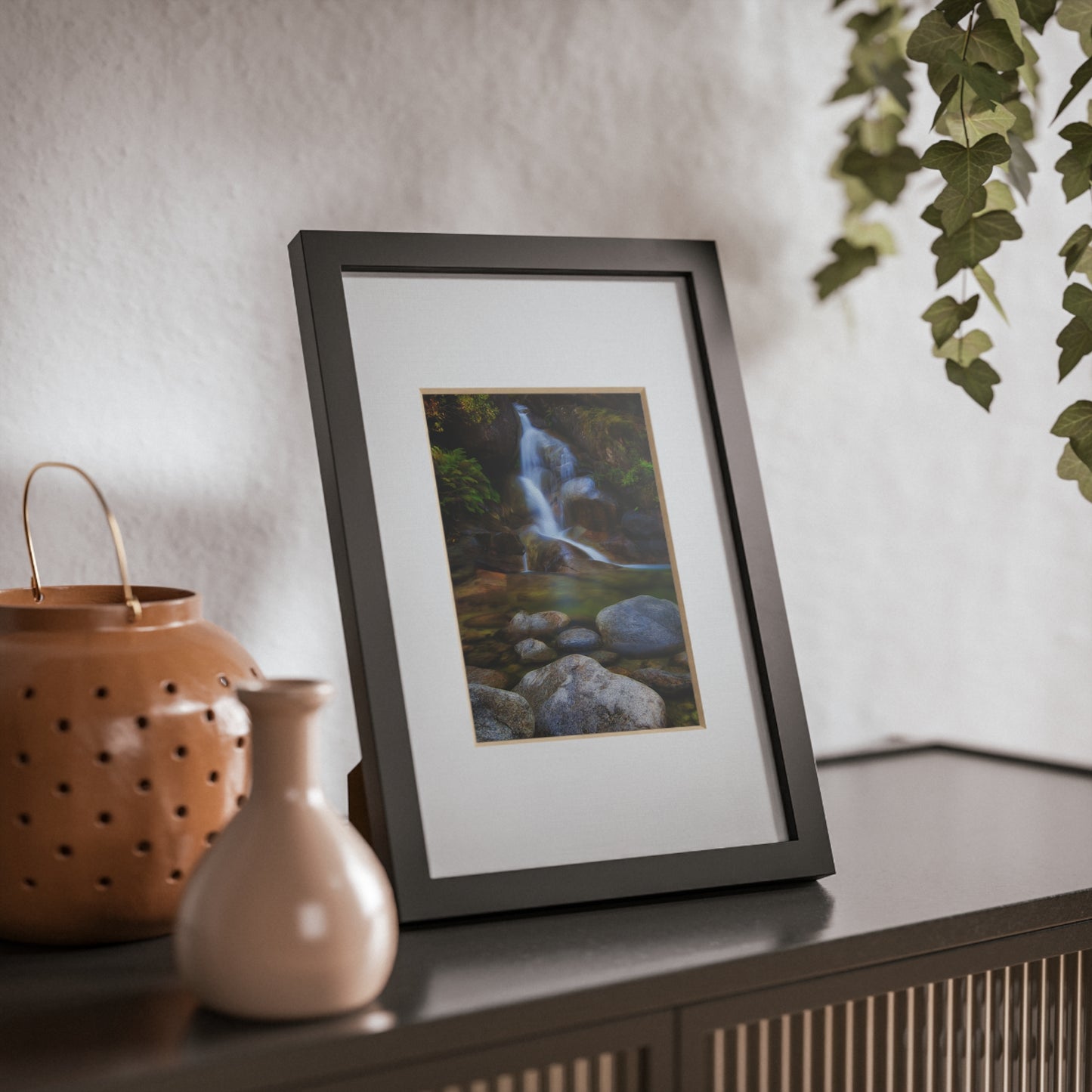 Watercolor styled print of the Ladies Bath falls on a black framed poster