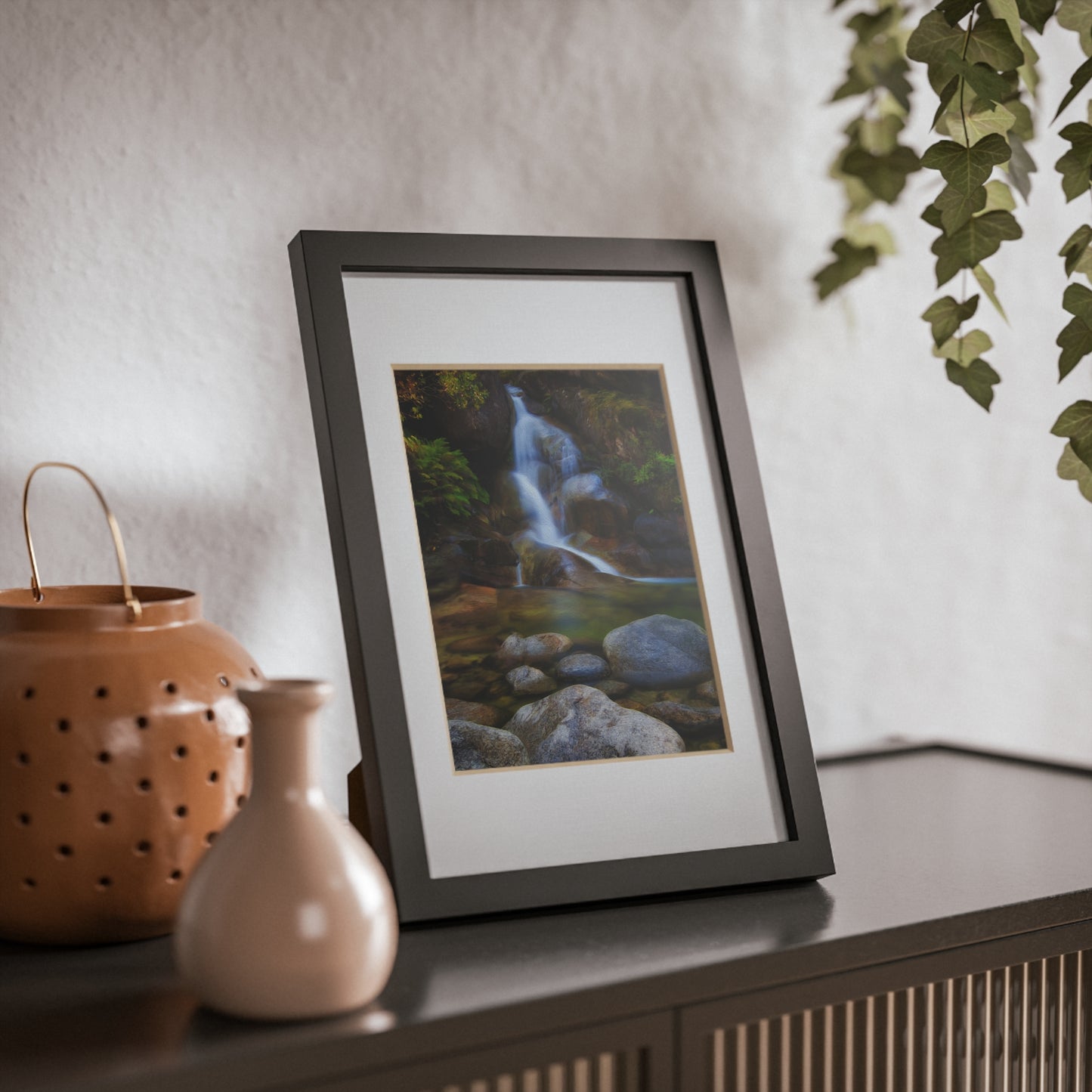 Watercolor styled print of the Ladies Bath falls on a black framed poster