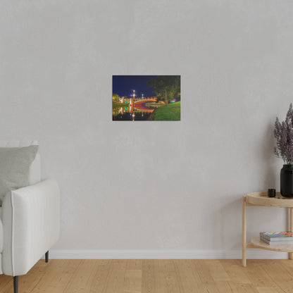 The stunning Victoria Bridge brightly lit at night printed on a stretched matte canvas