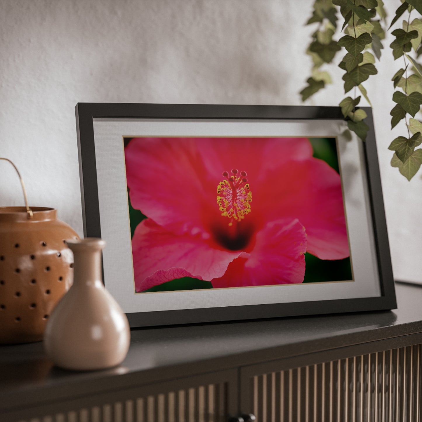 A beautiful hibiscus flower printed on a black framed poster