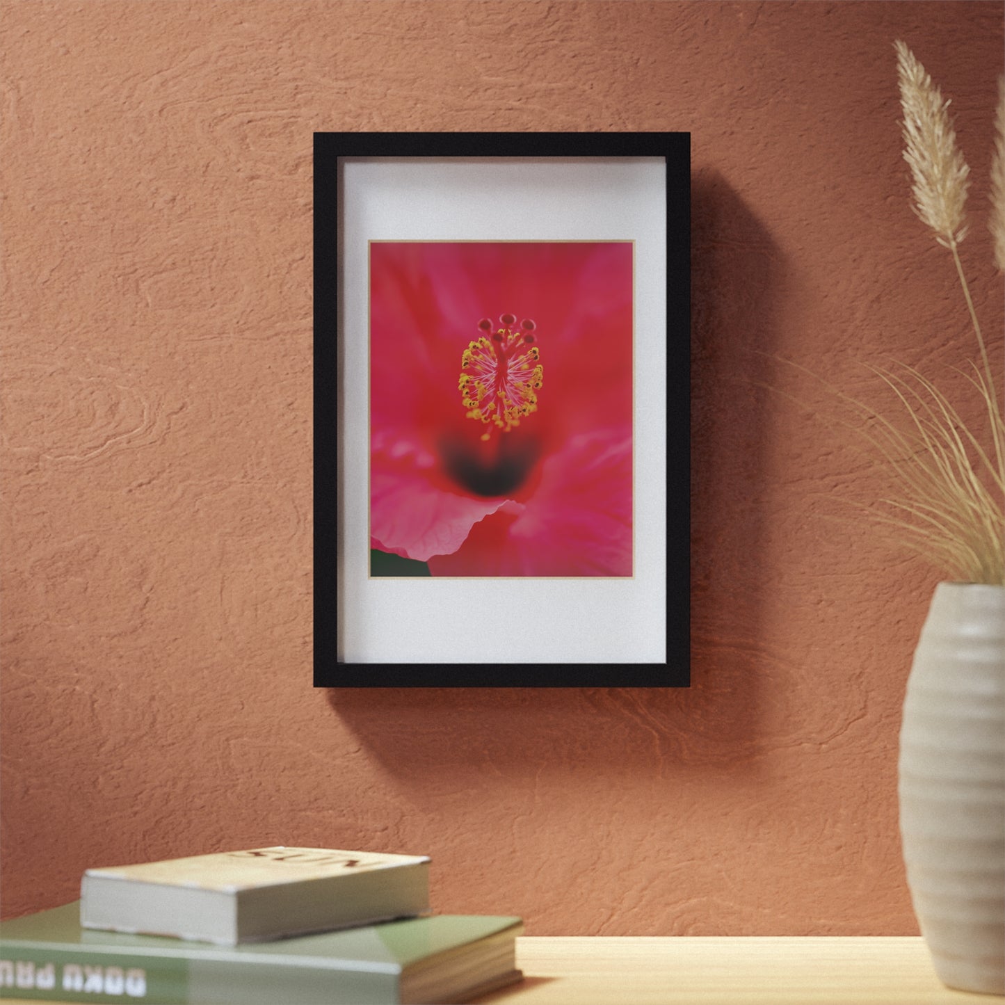 A beautiful hibiscus flower printed on a black framed poster