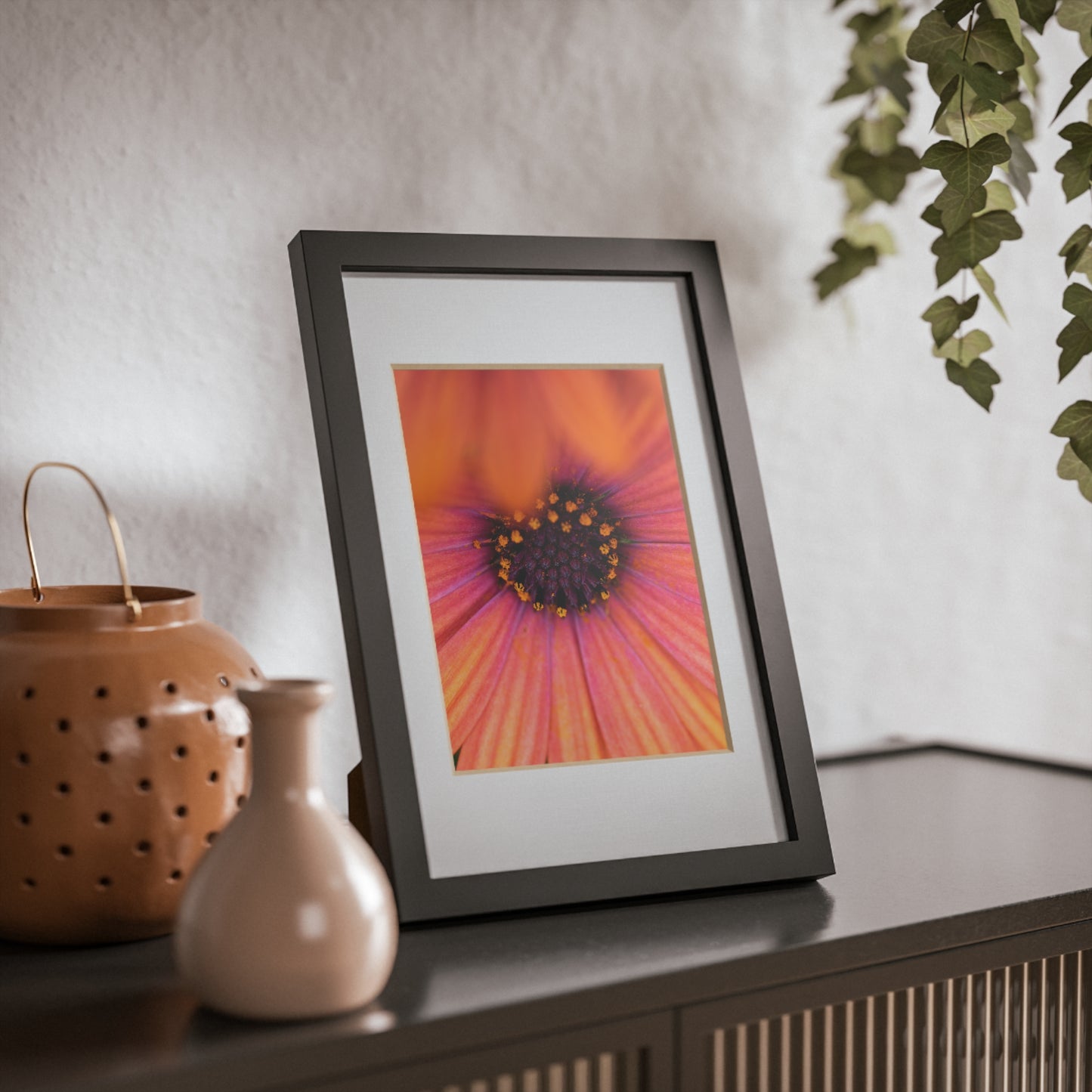 Colorful daisy printed on a black framed posters