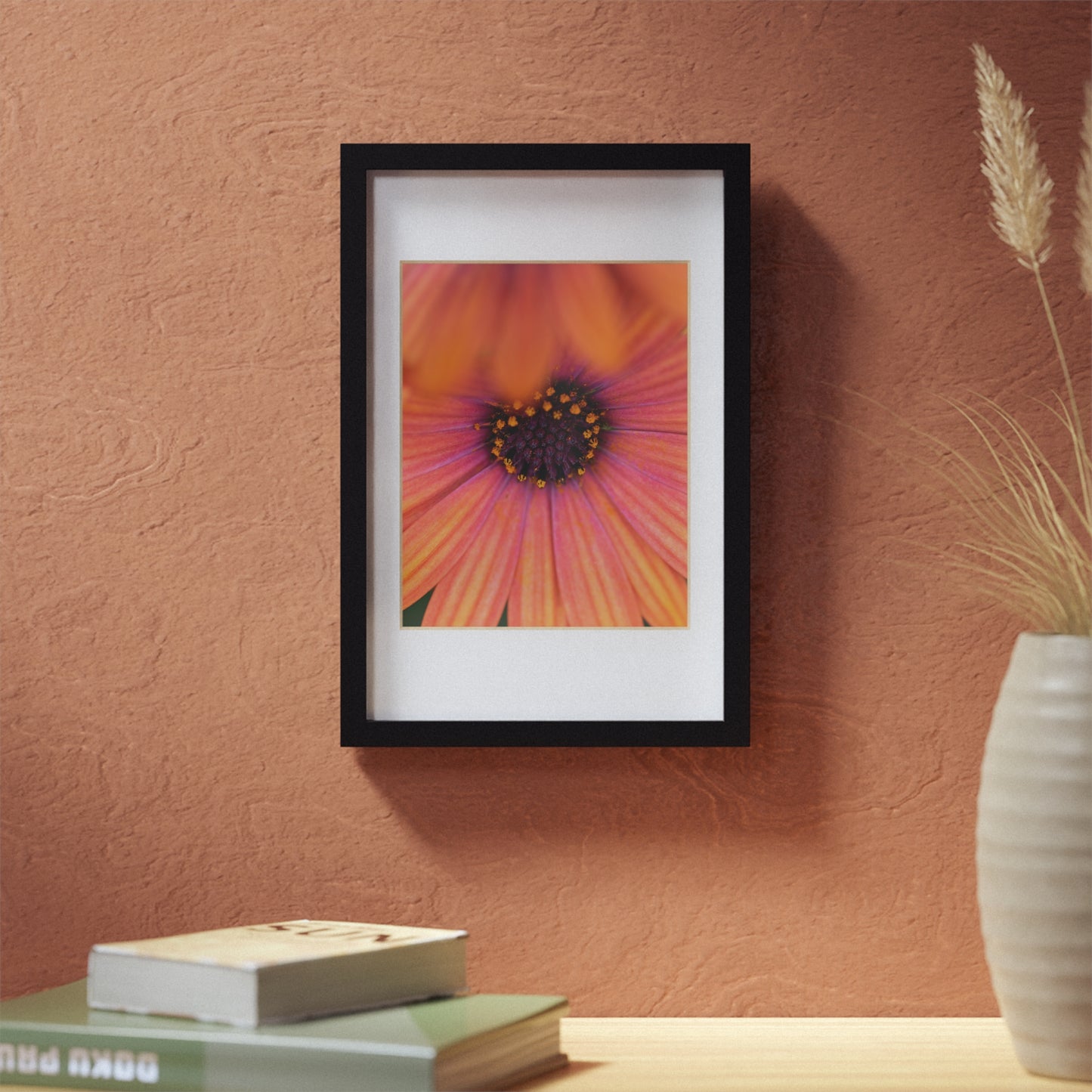 Colorful daisy printed on a black framed posters