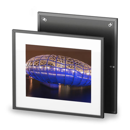 The beautiful Webb Bridge illuminated at night printed on a framed matte poster