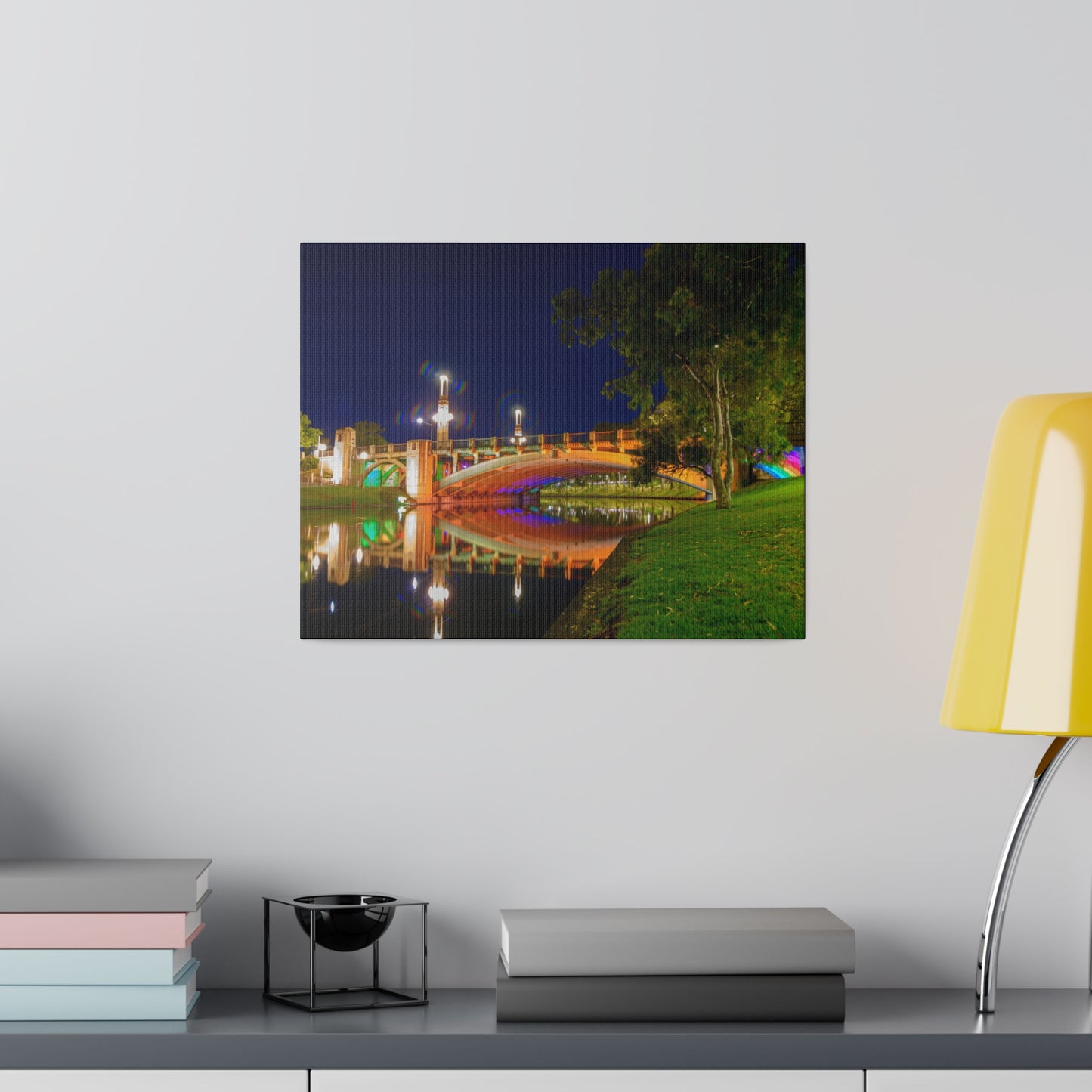 The stunning Victoria Bridge brightly lit at night printed on a stretched matte canvas