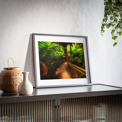 Wooden bridge winding through a lush forest of tall ferns printed on a framed matte poster