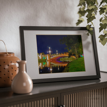 The stunning Victoria Bridge brightly lit at night printed on a black framed poster