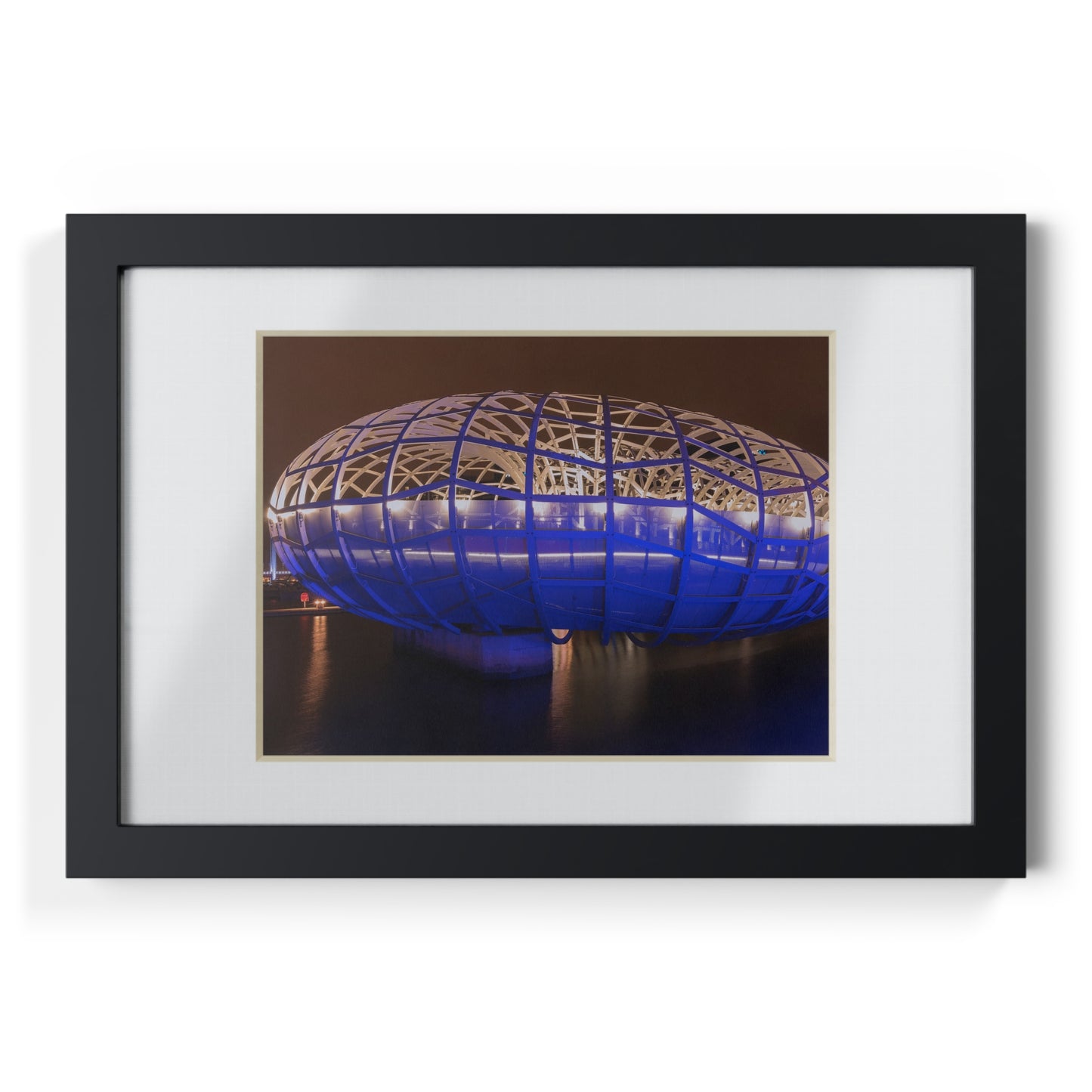 The beautiful Webb Bridge illuminated at night printed on a black framed poster