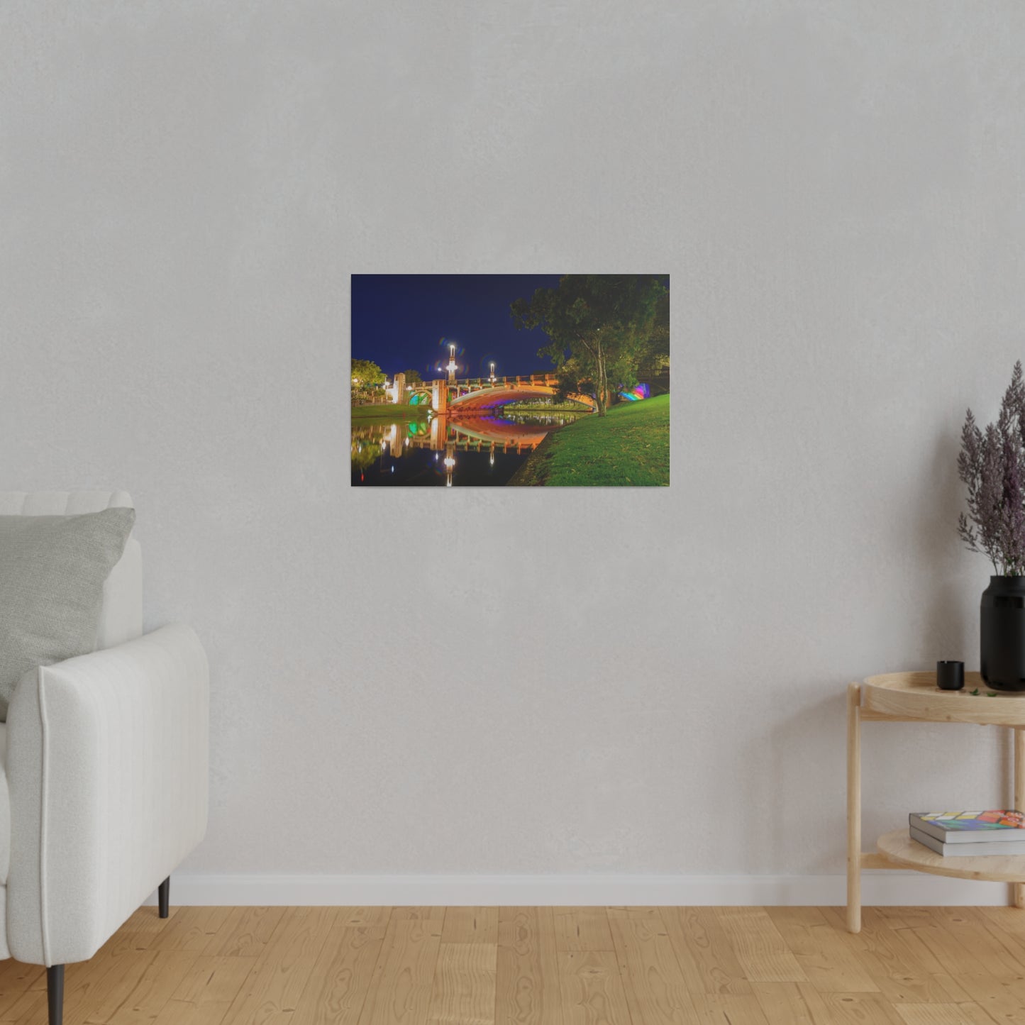 The stunning Victoria Bridge brightly lit at night printed on a stretched matte canvas