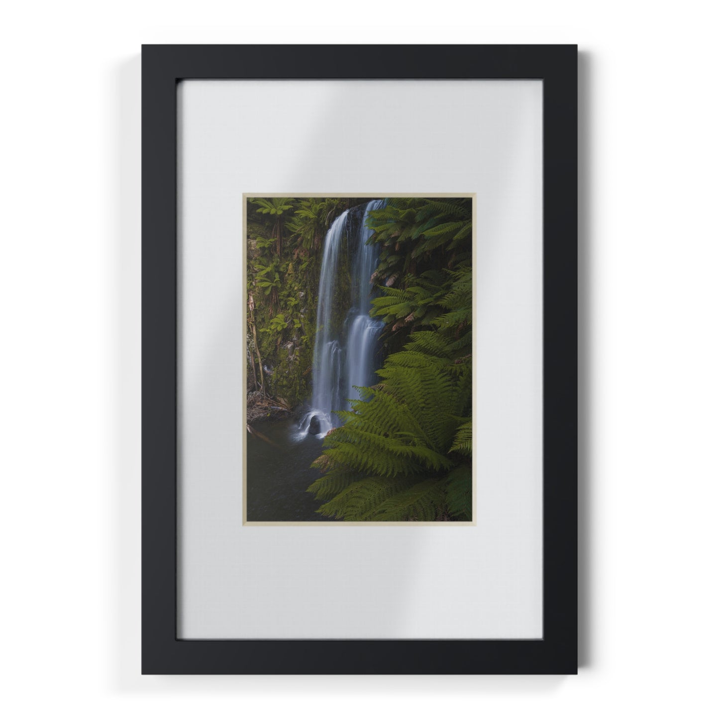 The beautiful Beauchamp Falls printed on a black framed poster