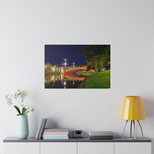 The stunning Victoria Bridge brightly lit at night printed on a stretched matte canvas