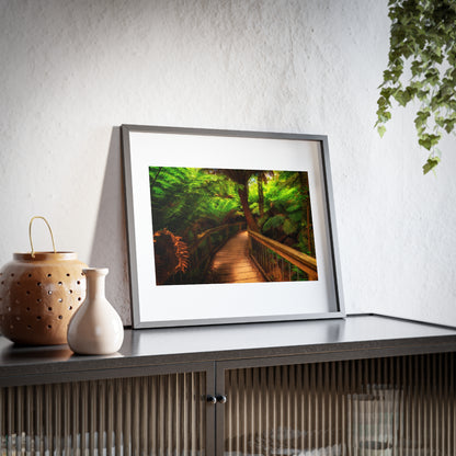 Wooden bridge winding through a lush forest of tall ferns printed on a framed matte poster