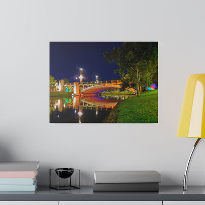 The stunning Victoria Bridge brightly lit at night printed on a stretched matte canvas