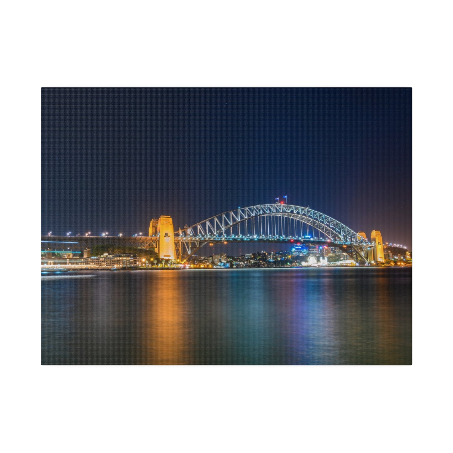 The dazzling Sydney Harbour Bridge at night printed on a stretched matte canvas