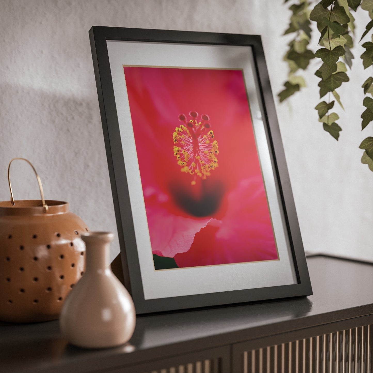 A beautiful hibiscus flower printed on a black framed poster