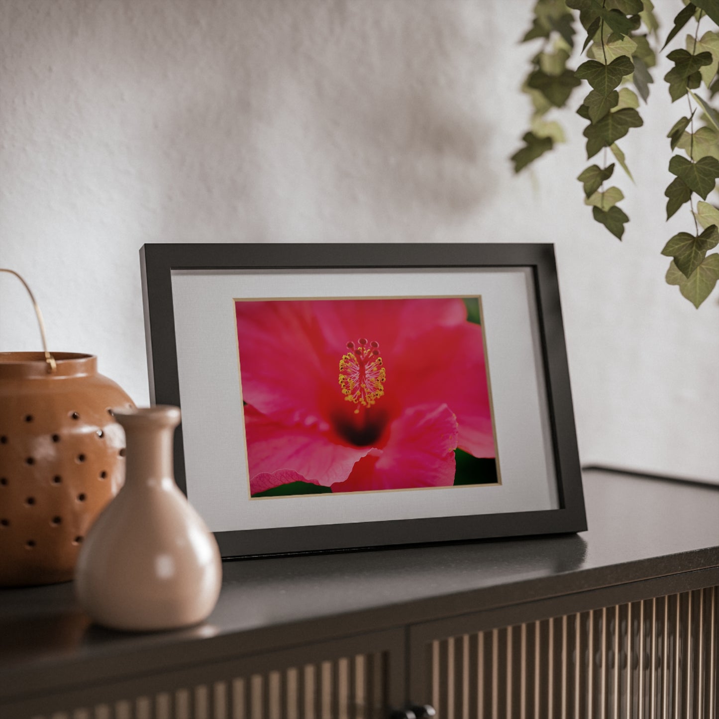 A beautiful hibiscus flower printed on a black framed poster