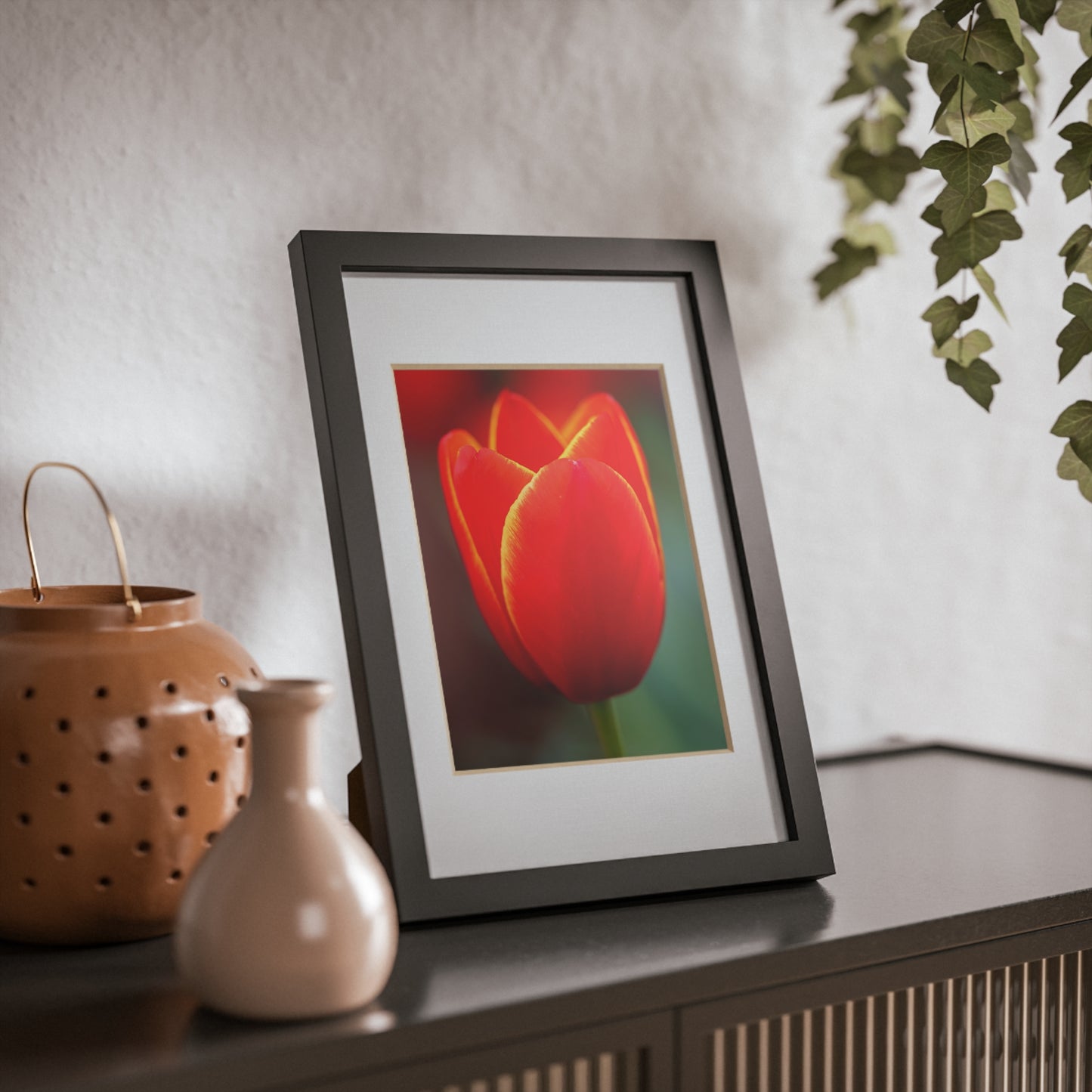 Fiery red and yellow tulip in a black framed poster