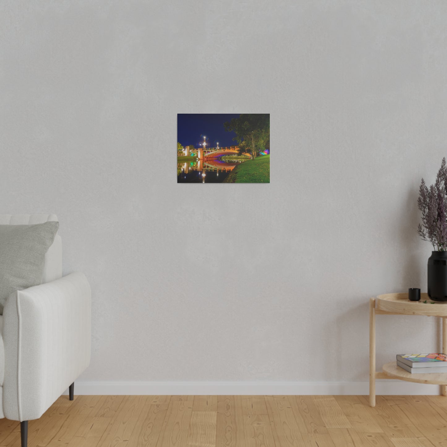 The stunning Victoria Bridge brightly lit at night printed on a stretched matte canvas