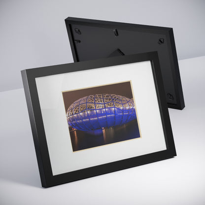 The beautiful Webb Bridge illuminated at night printed on a black framed poster