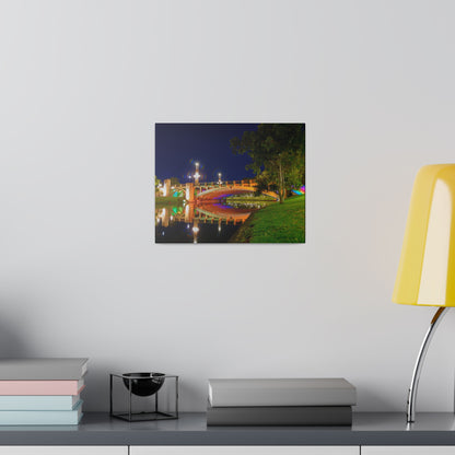 The stunning Victoria Bridge brightly lit at night printed on a stretched matte canvas