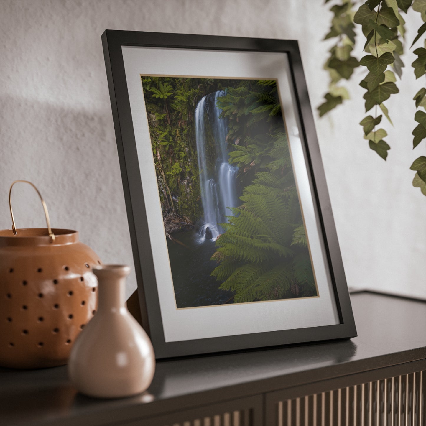 The beautiful Beauchamp Falls printed on a black framed poster