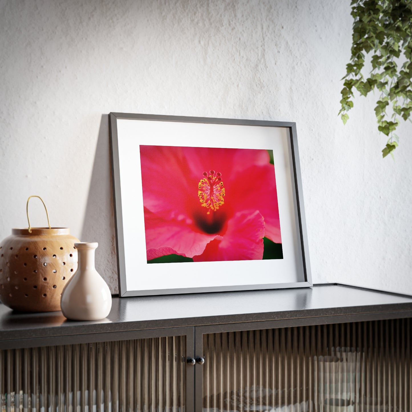 A beautiful hibiscus flower printed on a framed matte poster