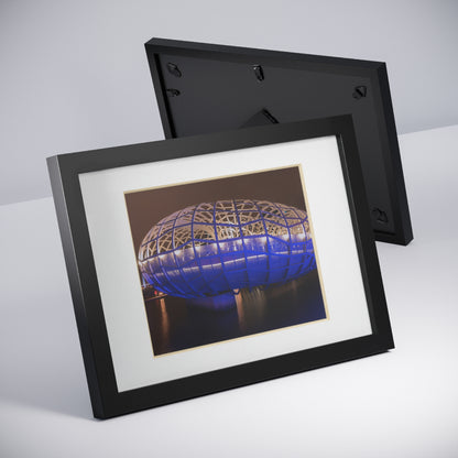 The beautiful Webb Bridge illuminated at night printed on a black framed poster