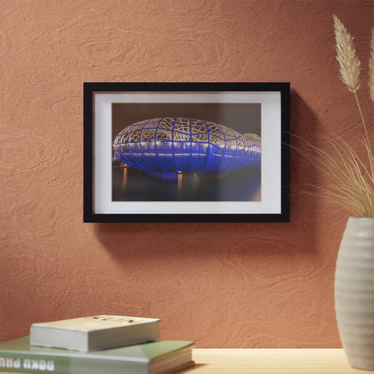 The beautiful Webb Bridge illuminated at night printed on a black framed poster
