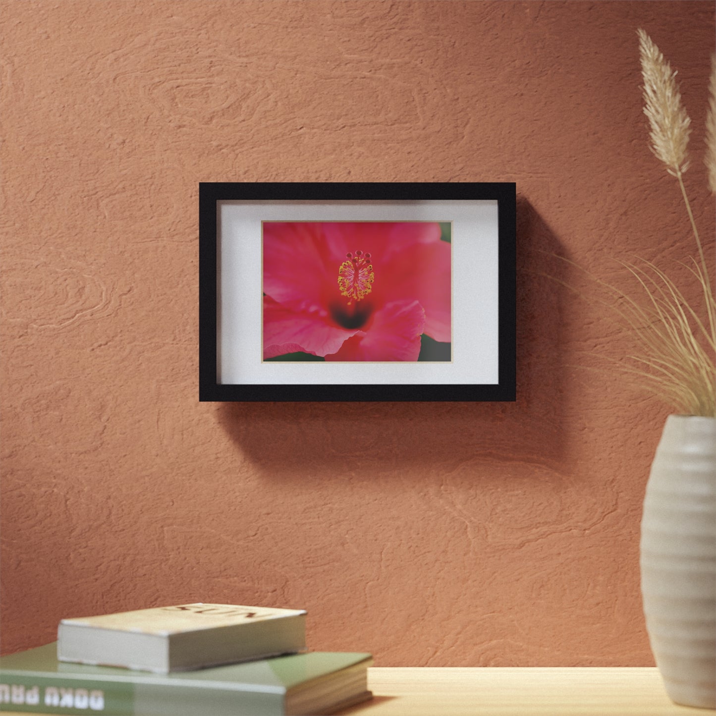 A beautiful hibiscus flower printed on a black framed poster