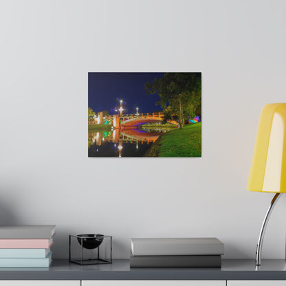 The stunning Victoria Bridge brightly lit at night printed on a stretched matte canvas