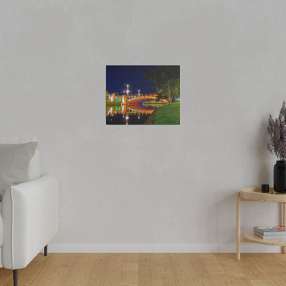 The stunning Victoria Bridge brightly lit at night printed on a stretched matte canvas