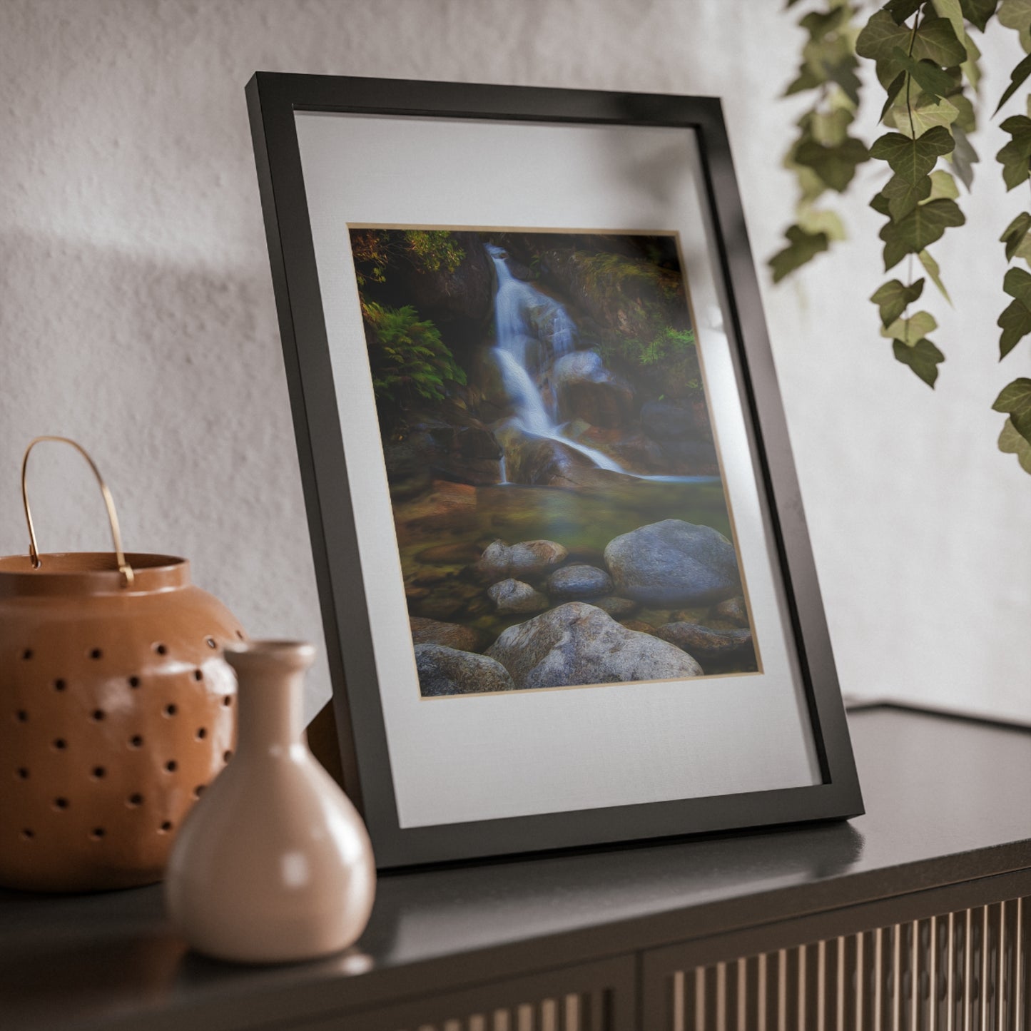 Watercolor styled print of the Ladies Bath falls on a black framed poster